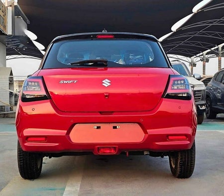 Rouge Suzuki Swift 2025