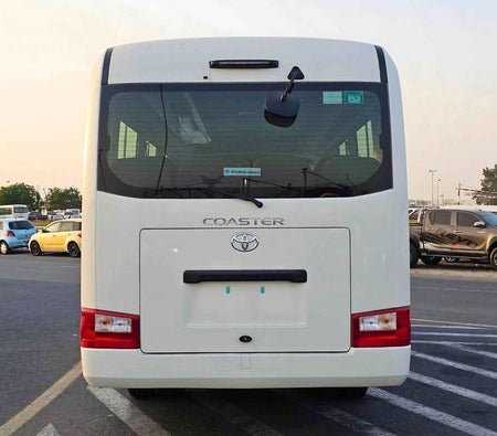 Blanc Toyota Coaster 2025
