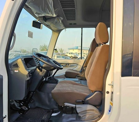 Blanc Toyota Coaster 2025