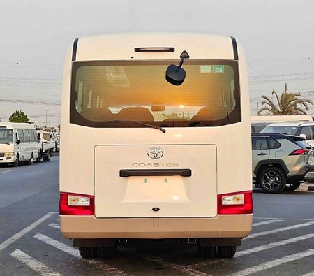 Weiß Toyota Coaster 2026