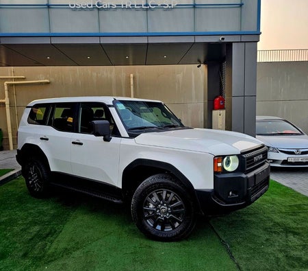 White Toyota Prado 2024
