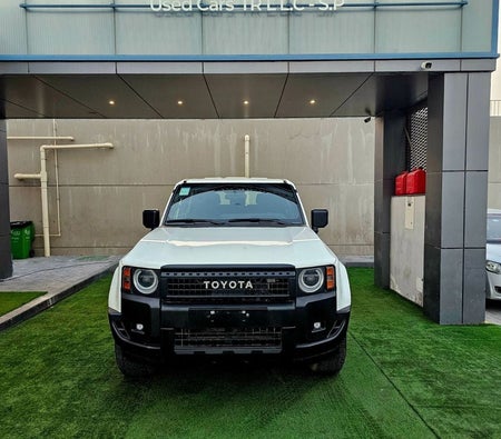 White Toyota Prado 2024