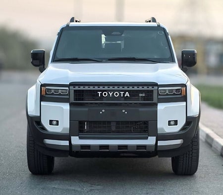 White Toyota Prado 2025