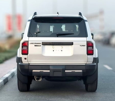 White Toyota Prado 2025